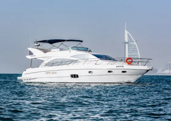 luxury yacht fleet lagoona cruising near exclusive hotel burj al arab in dubai